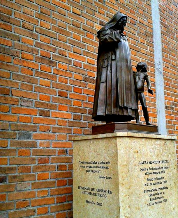 Statue of Saint Laura outside the church.